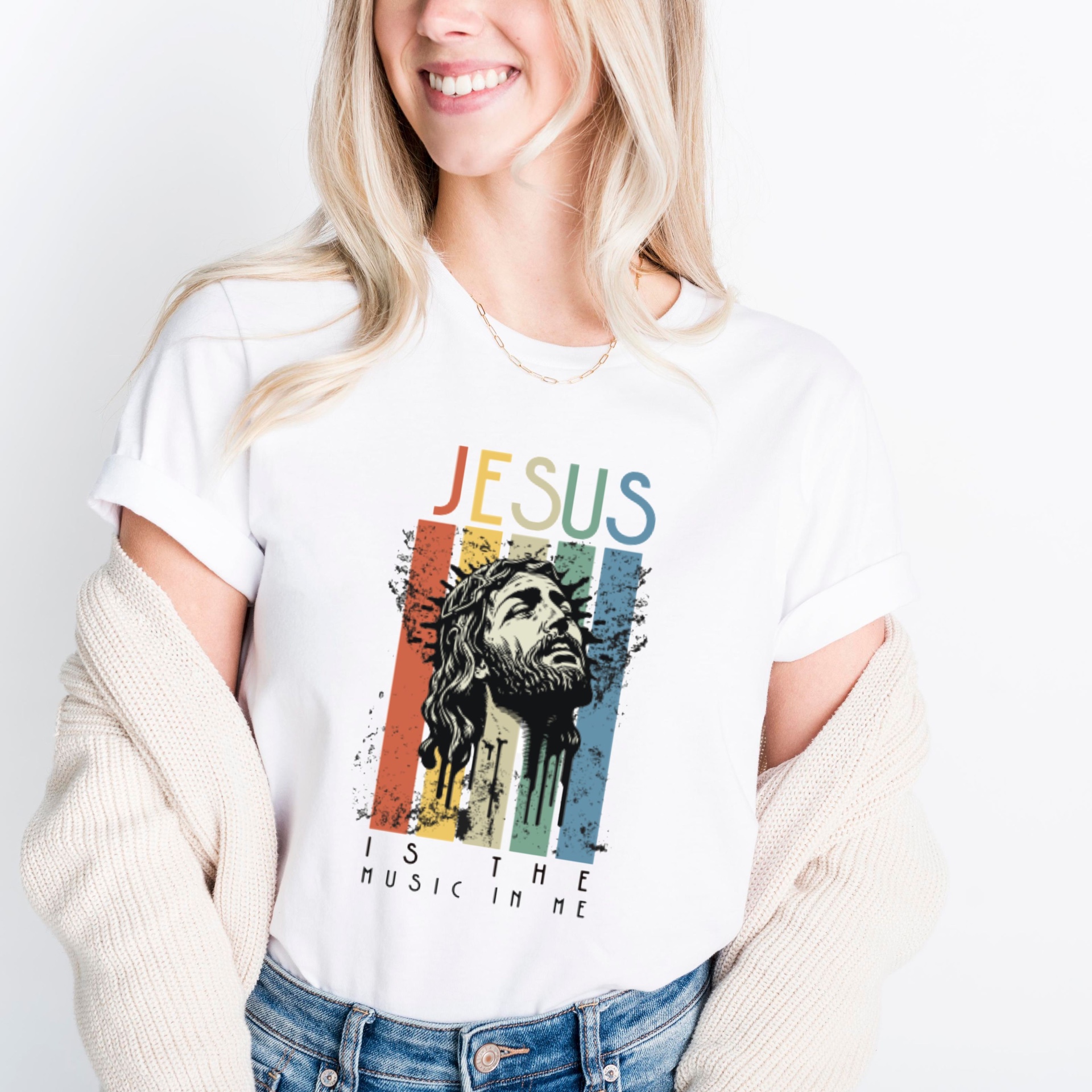 Close-up of white Jesus Is The Music In Me tee