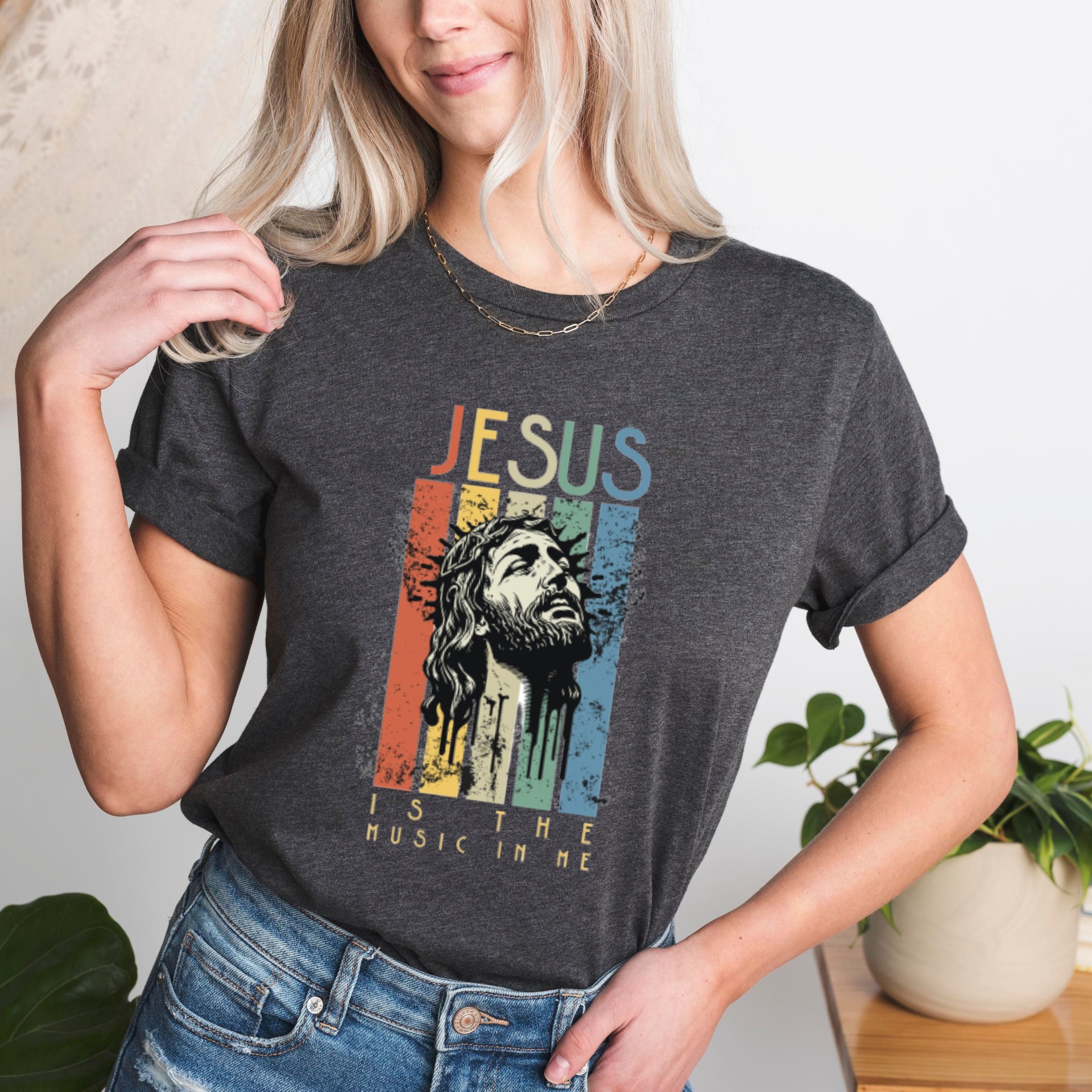 Woman in heather grey Jesus Is The Music In Me tee