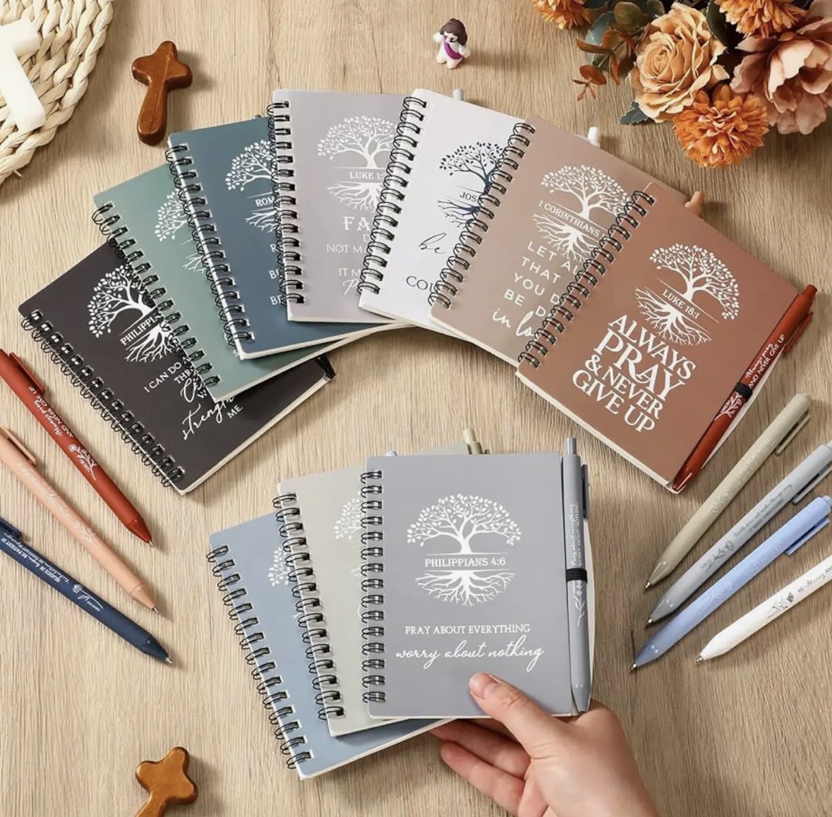 Faith Tree scripture journals fanned out in multiple cover colors