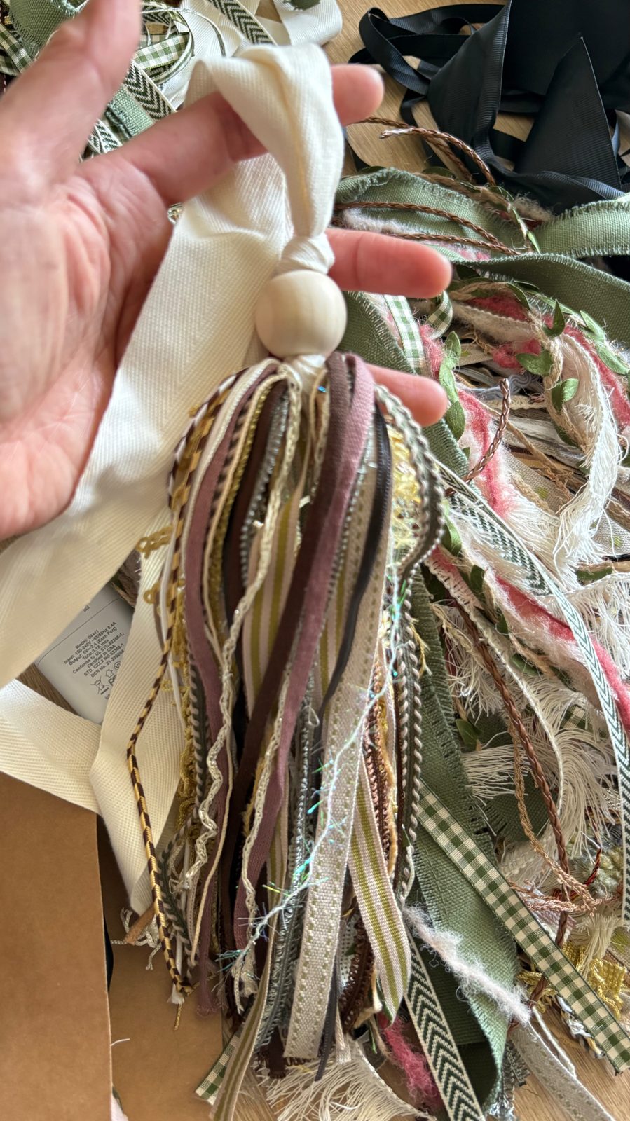 Neutral mauve and gold Bible bookmark tassel with a wooden bead top and ivory ribbon tie